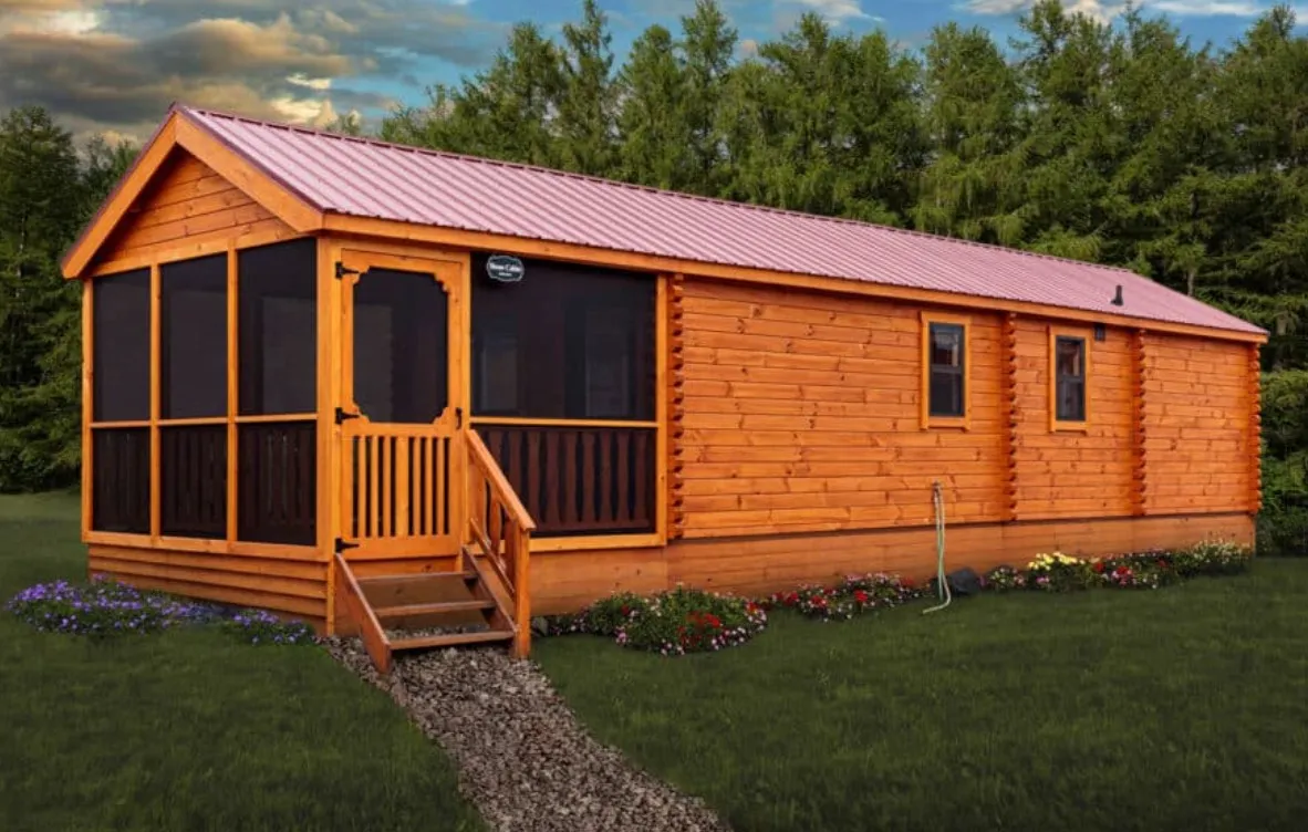 Wooden cabin with a porch and screened-in entry